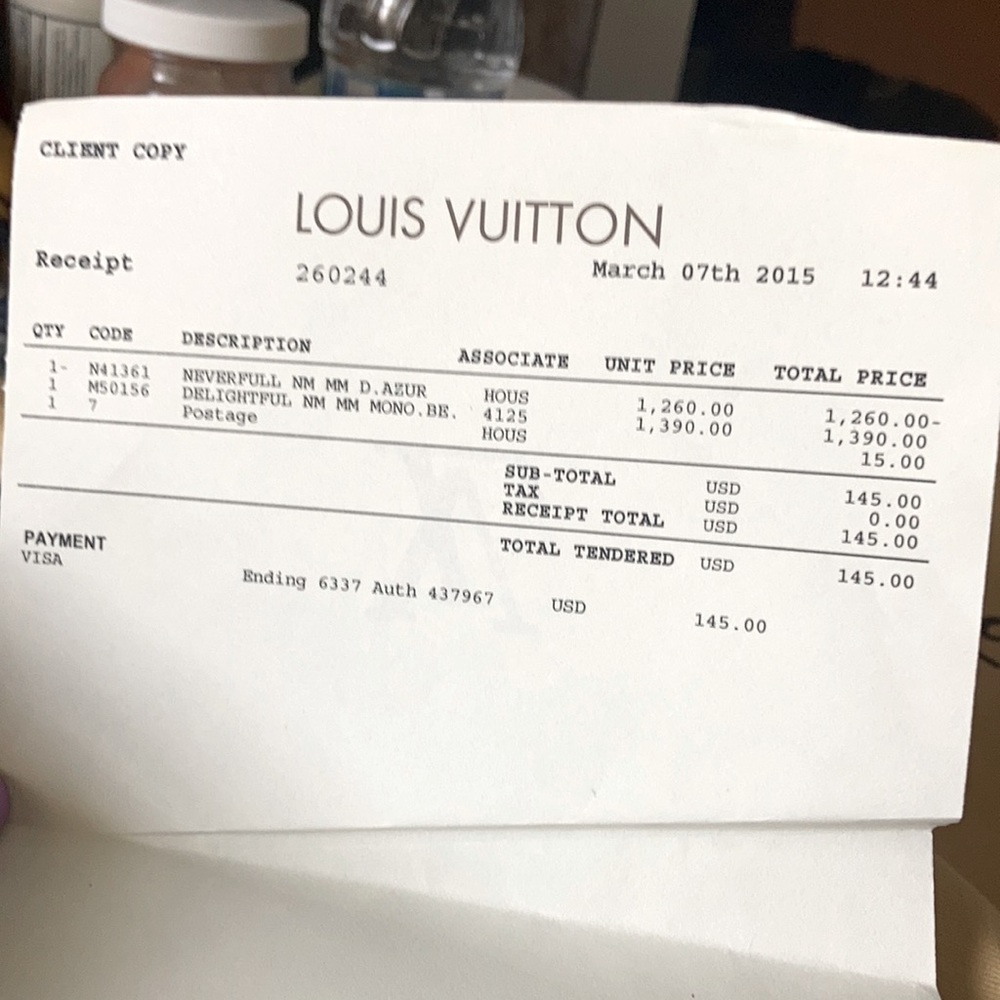 Louis vuitton medium brown bag few rough marks brown trim